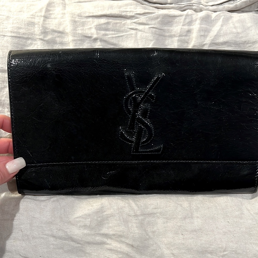YSL Belle de Jour Clutch -6x11 black patent , like new. No flaws.